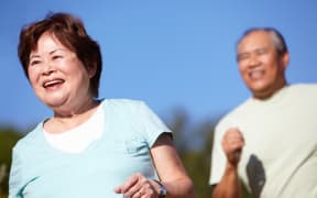 Senior couple jogging