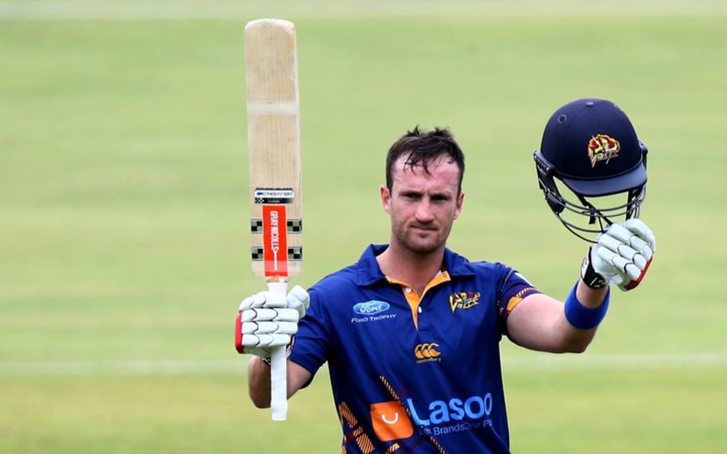 Neil Broom of Otago celebrates his century. Photo: Dianne Manson / www.photosport.nz