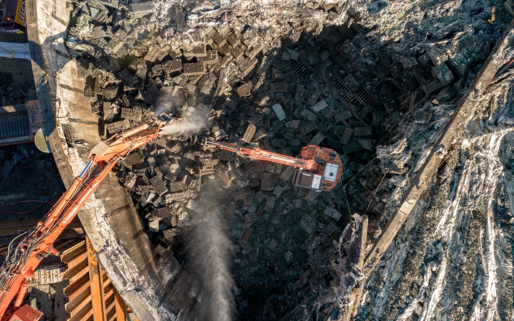 Trickling filter media being removed
