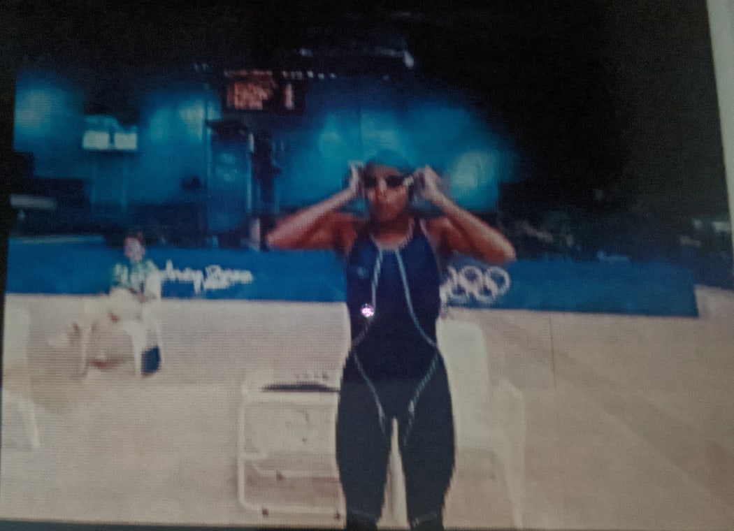 Nicole's family took a photo of her on the jumbotron before her Olympic race.