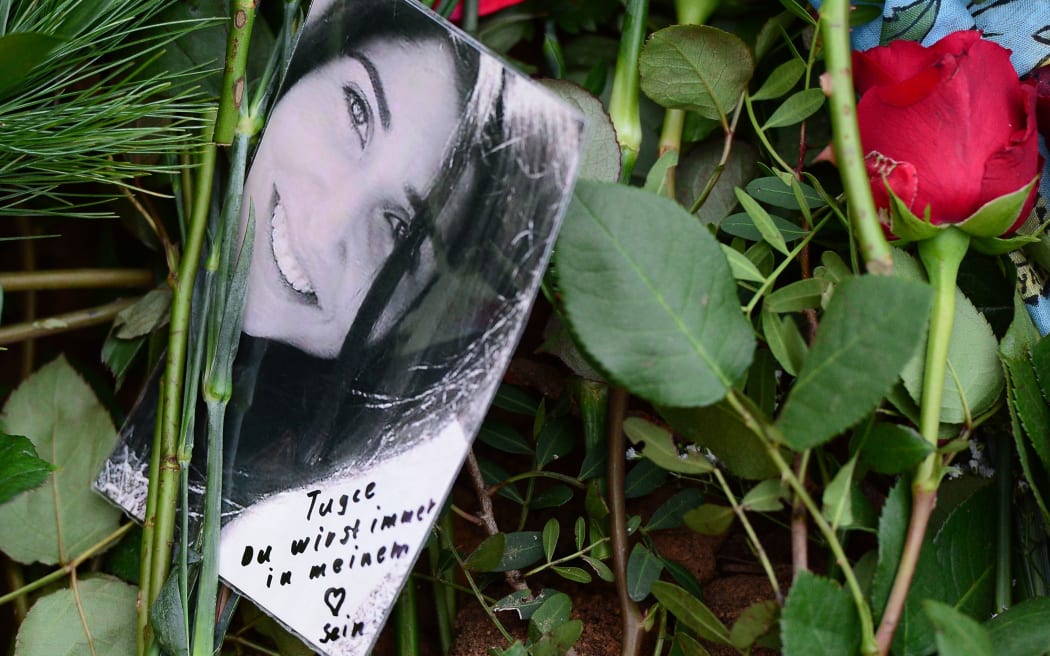 Flowers cover the grave of murdered student Tugce Albayrak in the cemetery in Bad Soden-Salmuenster, German.