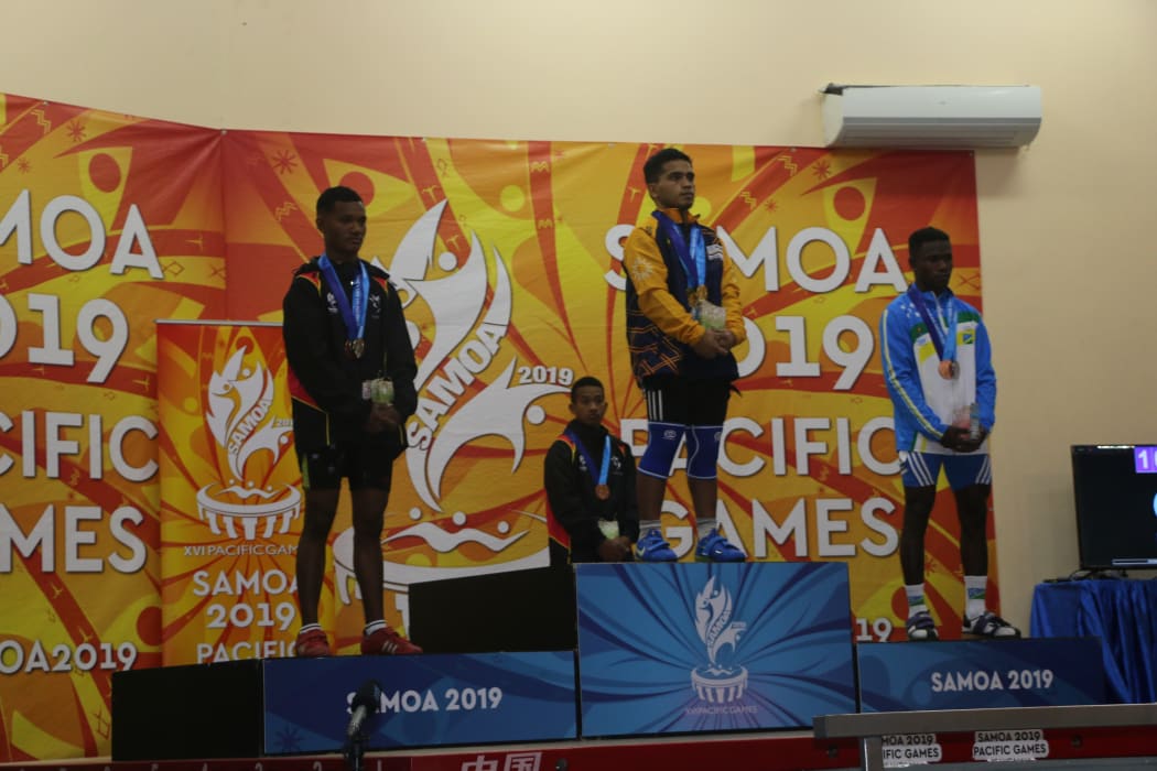 Nauru weightlifter Elson Brechtefeld dominated the men's 55kg event.