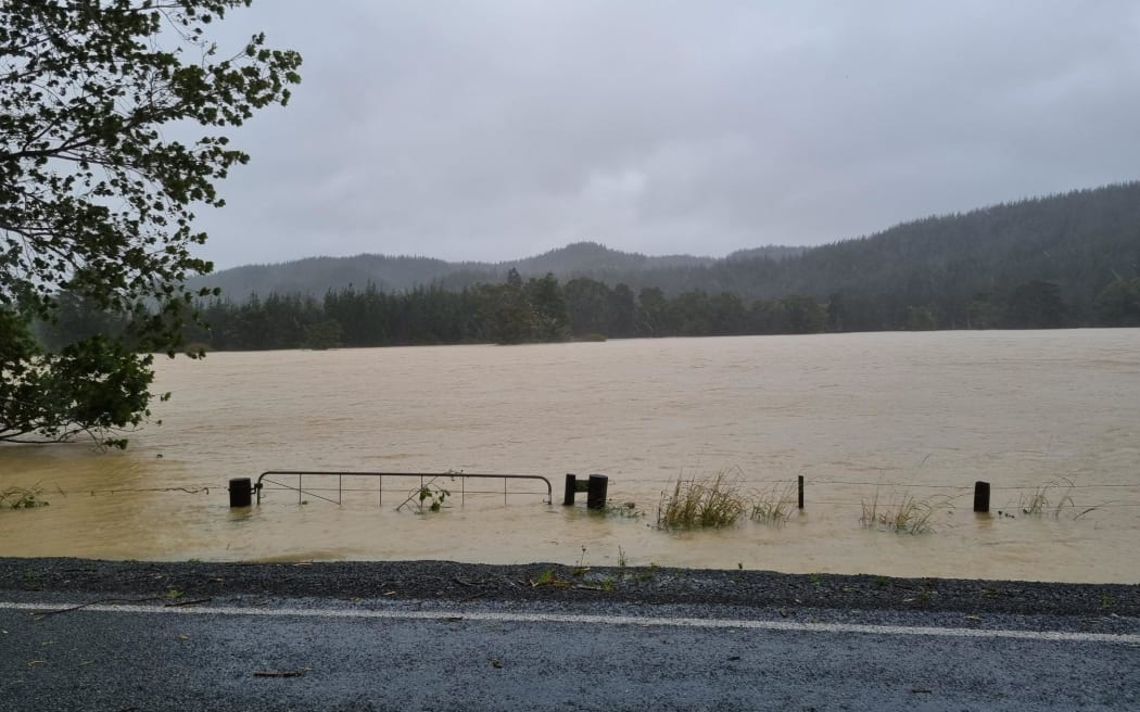 Flooded roads in Kaipara District, Northland.