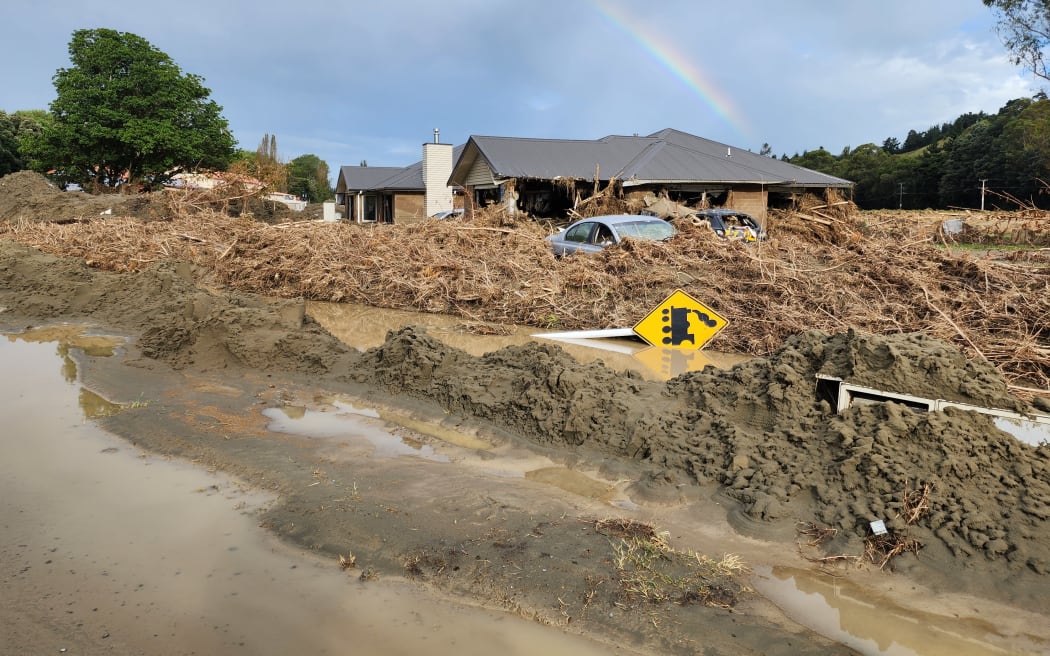 A flooded house in Eskdale where a family was rescued from their ceiling cavity