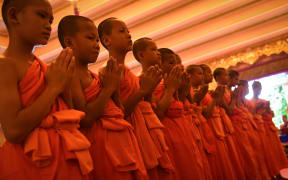 The Thai boys freed from a flooded cave in a rescue bid that gripped the world left the Buddhist monastery 11 days after ordaining as novice monks to honour a diver who died in the mission to save them.