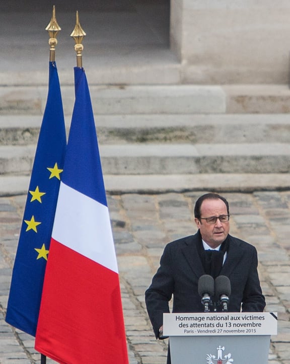 French President Francois Hollande speaks at Les Invalides in Paris during the national memorial ceremony for the victims of the November 13 terrorist attacks.