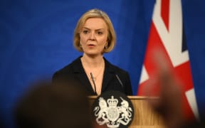 Britain's Prime Minister Liz Truss holds a press conference in the Downing Street Briefing Room on 14 October, 2022, following the sacking of the finance minister in response to a budget that sparked markets chaos.
