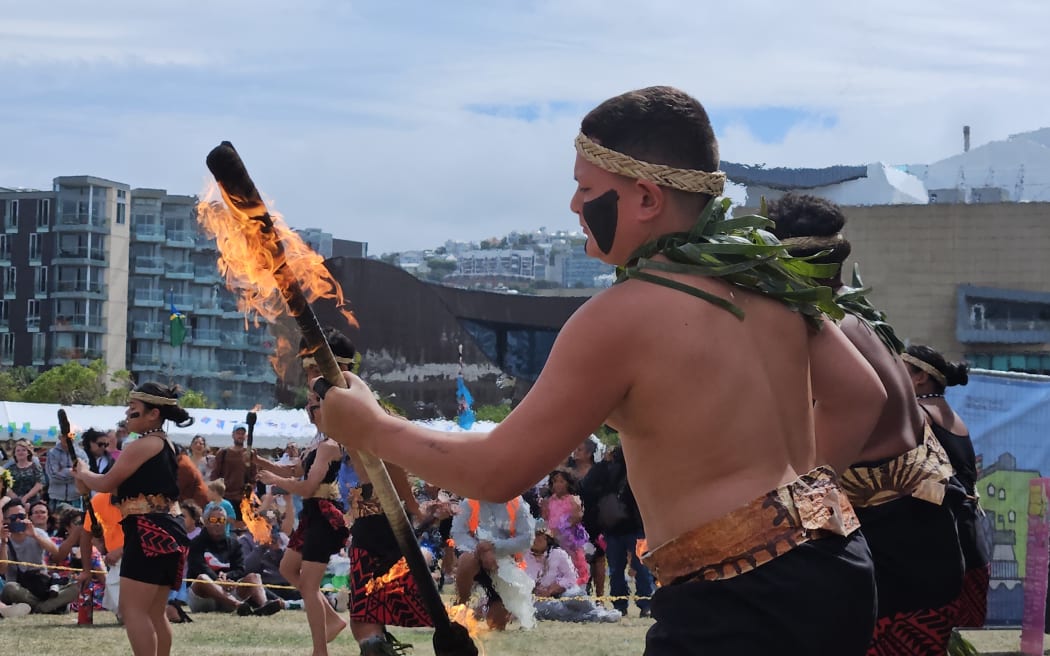 Tautua Dance students perform a Siva Afi showcase at the Wellington Pasifika Festival 2024.