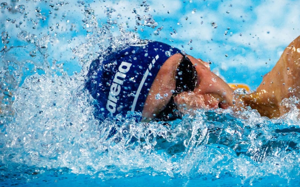 Lewis Clareburt competes in the men’s open 400m individual medley event at the Australian Open Swimming Championships at the Gold Coast Aquatic Centre on April 20, 2024. (Photo by Patrick HAMILTON / AFP) / -- IMAGE RESTRICTED TO EDITORIAL USE - STRICTLY NO COMMERCIAL USE --