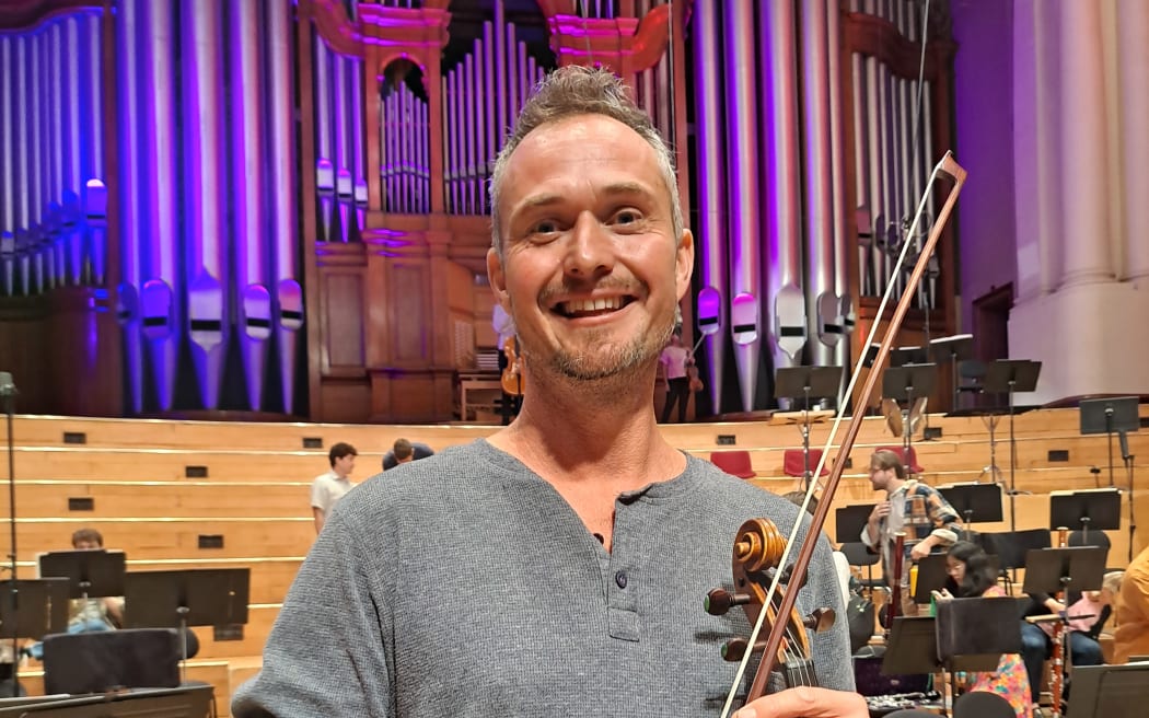 Auckland Philharmonia's Principal viola Robert Ashworth on stage at the Auckland Town Hall