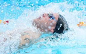 Corey Main of New Zealand competes in the Men's 100m Backstroke heats. 5 April 2018.