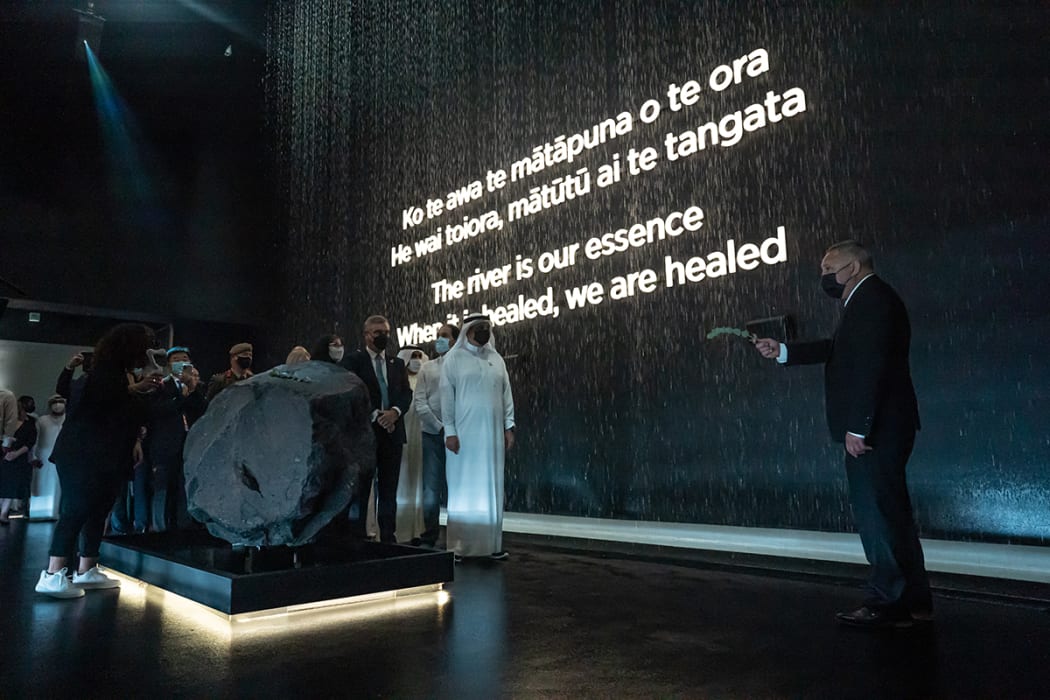 Whanganui iwi leader Gerrard Albert blesses a toka (boulder) from Mount Tongariro, the source of the Whanganui River, in the Aotearoa New Zealand pavilion at Expo 2020 Dubai.