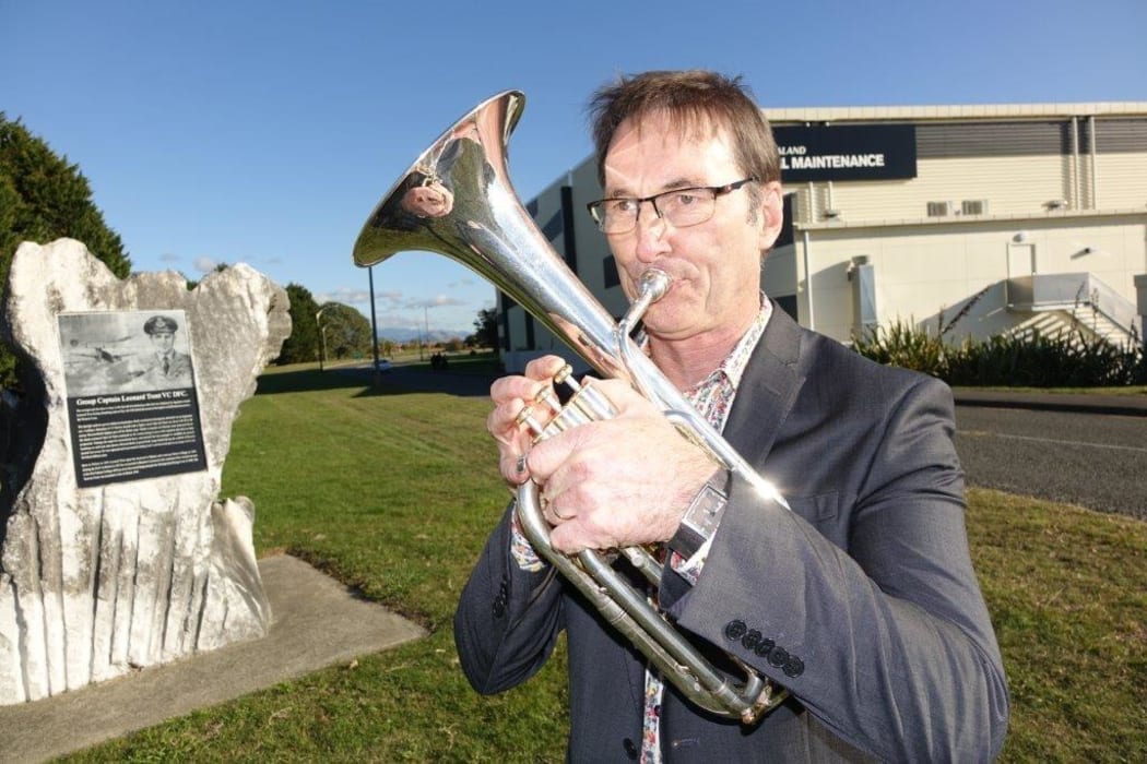 Nelson brass musician Mike Ford practises tenor horn near the airport walkway during his tea breaks at work.