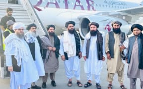 A high level Taliban delegation led by Foreign Minister Maulvi Amir Khan Mottaki (center) leave for Qatar. Senior Taliban officials and US representatives are to hold talks Saturday Oct 9 and Sunday Oct 10.