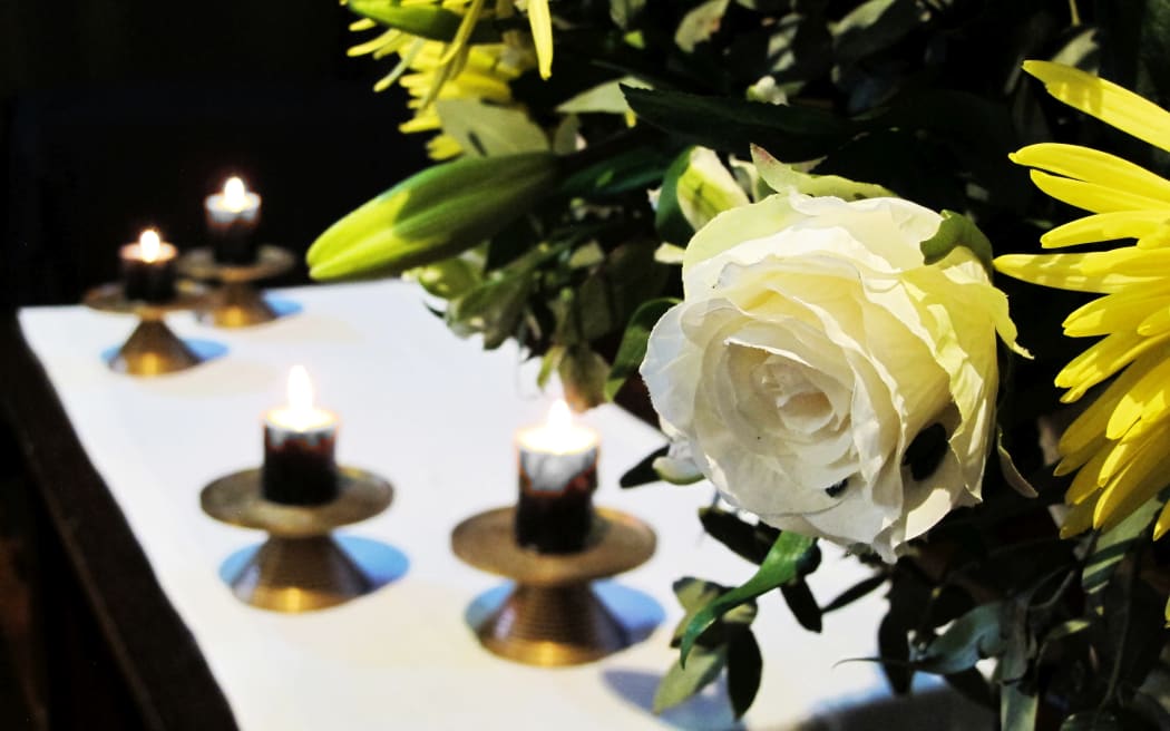 Flowers and candles on the altar at St Luke's Church, Remuera, Auckland.