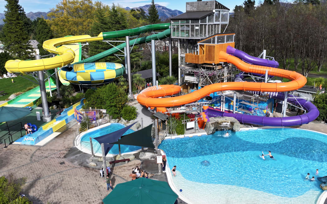The new waterslides (right) at Hanmer Springs pools have been named the Waiau Winder and Violet Vortex.