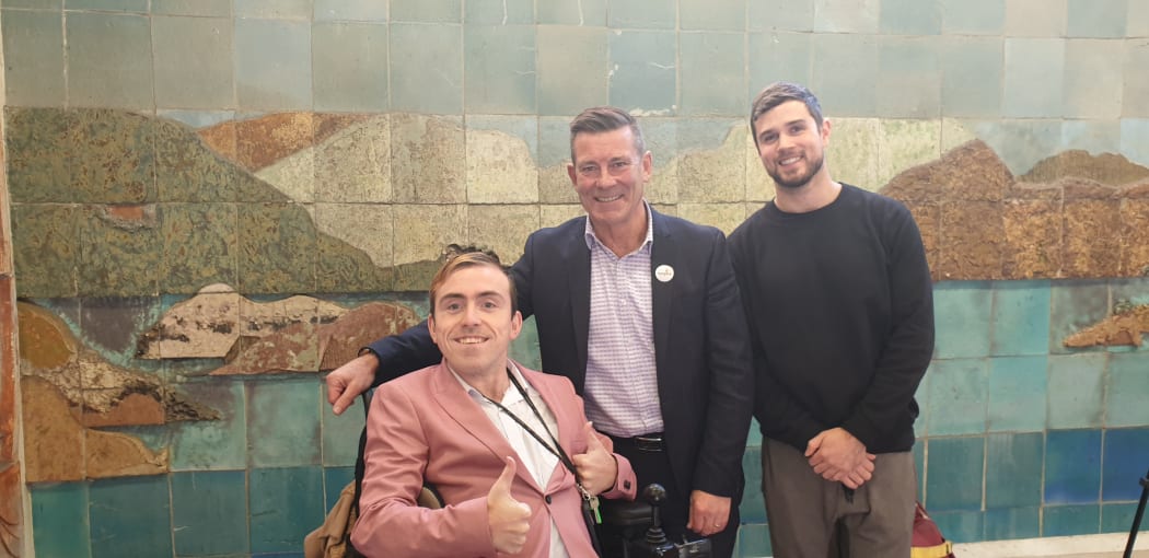 Joshua Perry, National list MP Michael Woodhouse and Mr Perry's carer Tim Marshall.