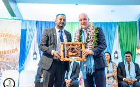 Krish Naidu, president of Fiji Girmit Foundation New Zealand, with Prime Minister Christopher Luxon at Girmit Remembrance Day commemorations in Auckland on 17 May.