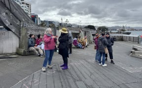 People on Wellington's City to Sea bridge on Sunday.