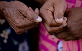 Some voters expressed happiness at being able to exercise their right to vote, while others said they prayed for God to bless the election.