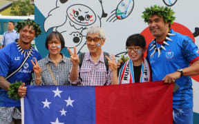 Bistol Sefa, right, and other RWC fans in Kobe