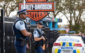 Armed police are standing guard outside the Harley Davidson story in Mt Wellington after a man was shot.
