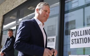 Labour party leader Keir Starmer arrives at a polling station to cast his vote in local elections in London.