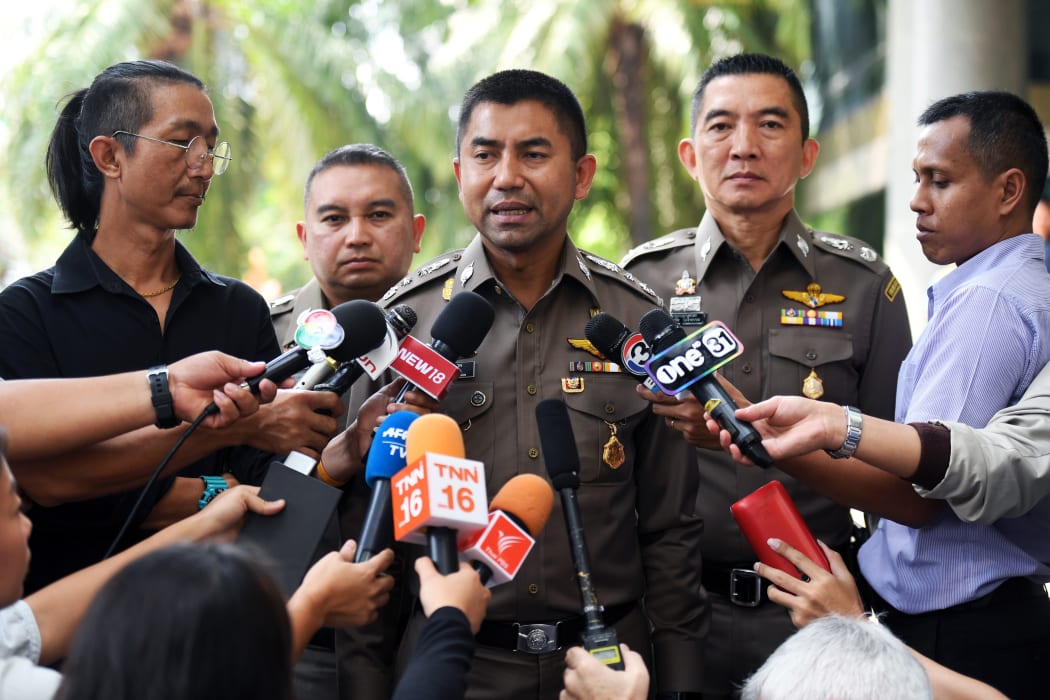 Thai immigration chief Surachet Hakparn (C) speaks outside the Saudi embassy after a meeting with Saudi officials in Bangkok on January 8, 2019 after young Saudi woman Rahaf Mohammed al-Qunun resisted deportation from Thailand.