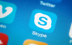 A Skype application icon on a mobile phone - next to Twitter and Vimeo.