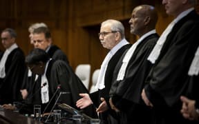 President Nawaf Salam (M) during a ruling by the International Court of Justice (ICJ) on the situation in Rafah. South Africa has asked the UN court to take action because there is a threat of genocide in the Gaza Strip.  (Photo by Koen van Weel / ANP MAG / ANP via AFP)