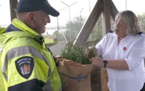 Corrections Horticulture Instructor Don Gillanders and Judith Newton from the Salvation Army.