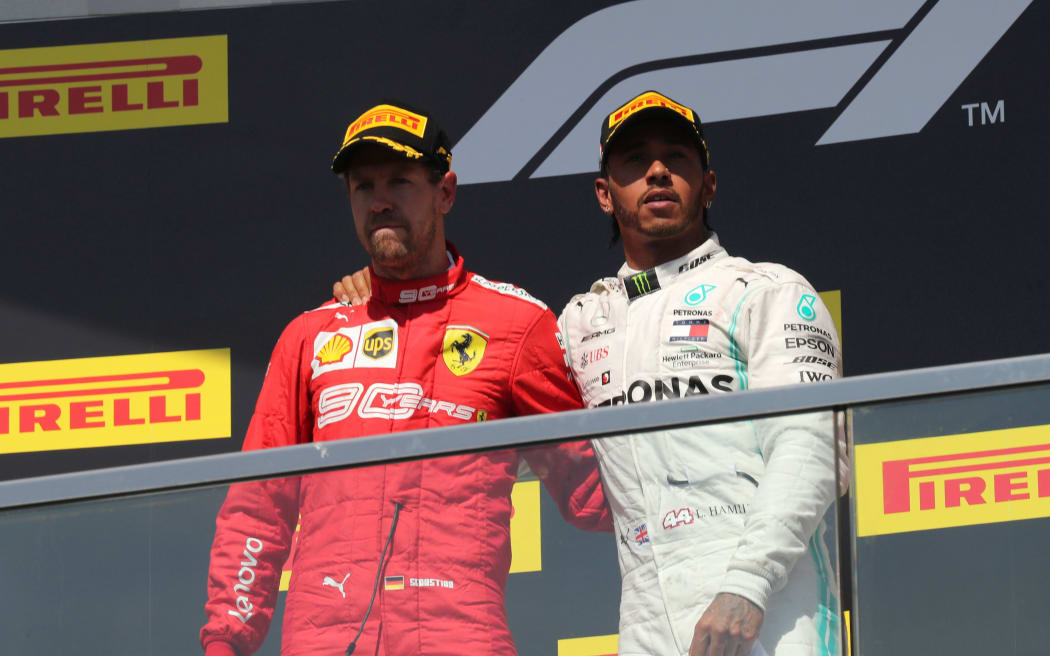 F1 drivers Sebastian Vettel and Lewis Hamilton.
