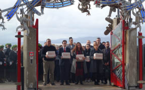 The ancestral remains are brought through Te Papa's waharoa.