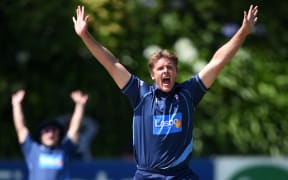 Auckland Aces bowler Michael Bates appeals for a wicket.