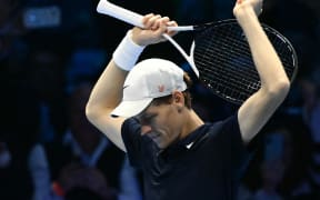 Italy's Jannik Sinner celebrates winning the 2024 ATP Finals in Turin.
