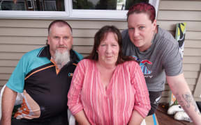 Karilyn Wildbore, centre, with partner Carl Lee and daughter Stacey Daymond-Wildbore.