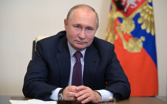Russian President Vladimir Putin is pictured during a meeting with Russian Prime Minister Mikhail Mishustin and Deputy Prime Ministers via a video linkup from the House of the Russian government, in Moscow, Russia.