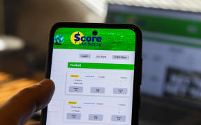 A re-creation of a person using an online sports betting platform.