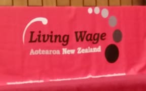 Wellington City Council could again face legal action after a pledge by several mayoral candidates to extend its living wage to all council contractors.