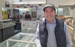 Chris Wells has been in the stamp and coin business since 1971. He credits his nephew Daniel Wells with the idea of giving sports trading cards a go.