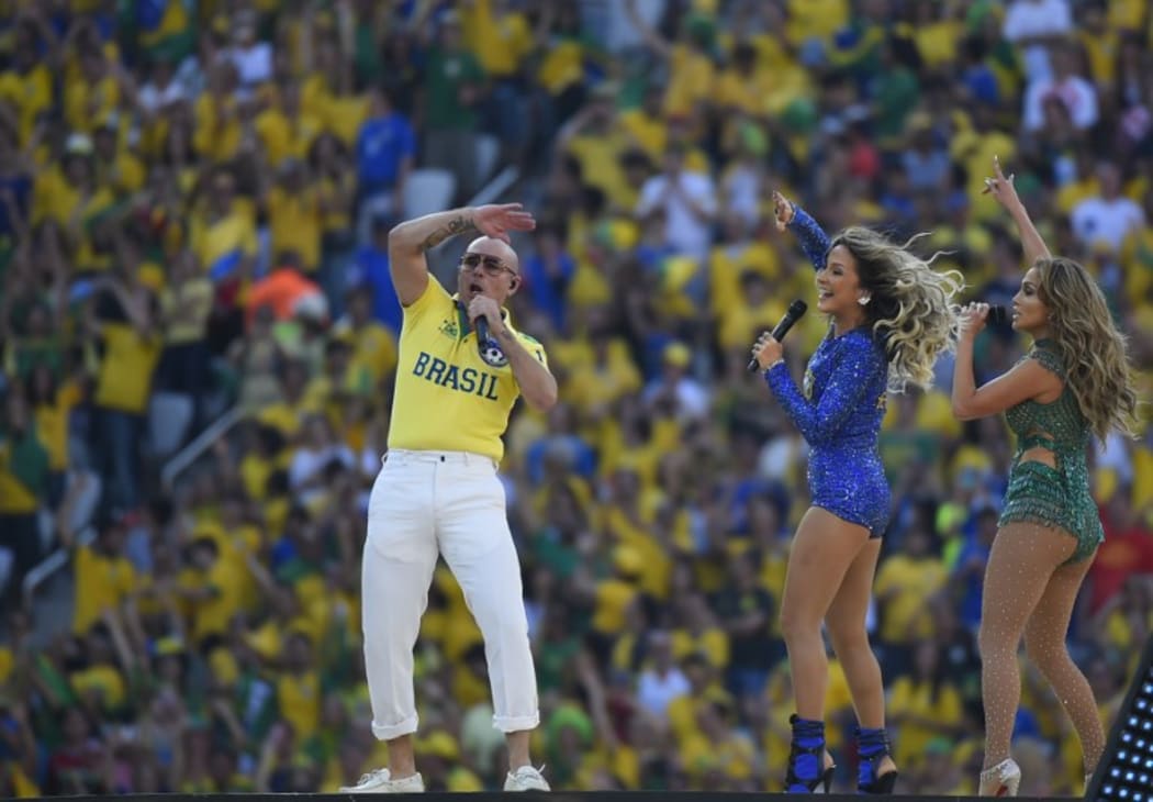 US rapper Pitbull, Brazilian singer Claudia Leitte and US singer Jennifer Lopez perform during the opening ceremony of the 2014 FIFA World Cup.