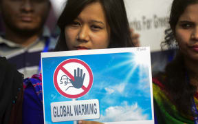 A climate march in Dhaka expressing solidarity ahead of the Paris Climate Summit.