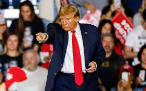 Former US President and 2024 presidential hopeful Donald Trump attends a 'Get Out the Vote' Rally in Conway, South Carolina, on 10 February, 2024.