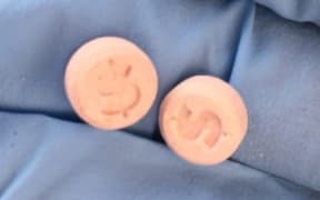 Police have released images of pills found in the possession of the 19-year-old man who died.