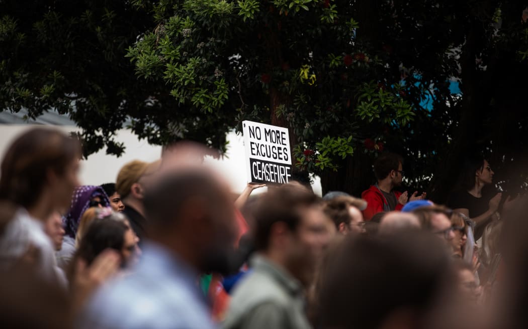 Hundreds of people gathered outside Parliament's steps to call on the government to demand an immediate and permanent ceasefire in Gaza on 5 December, 2023.