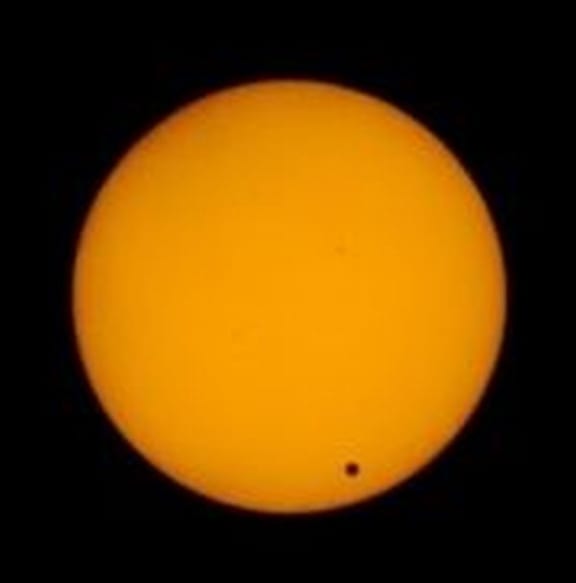 Venus is seen moving across the face of the sun, on June 6, 2012.