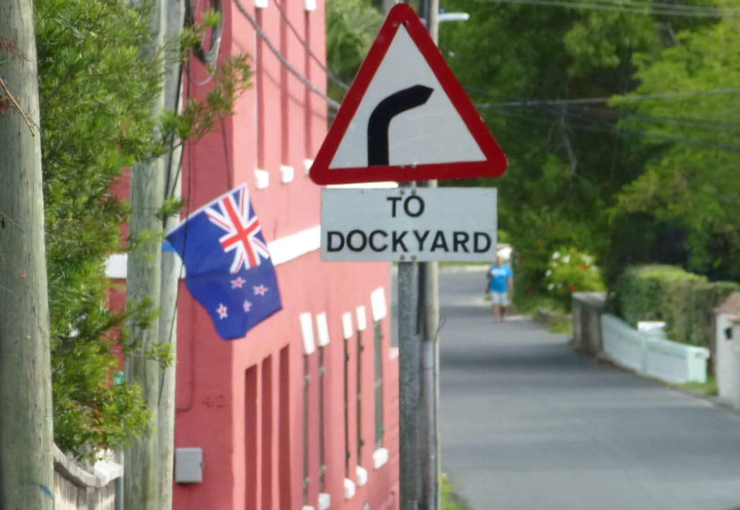 Large New Zealand flags have appeared on the road leading to the Cup Village in Bermuda.