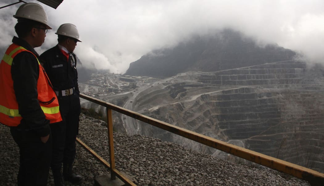 Freeport security personnel looking on at the Freeport McMoRan's Grasberg mining complex, one of the world's biggest gold and copper mines, located in Indonesia's remote eastern Papua province.