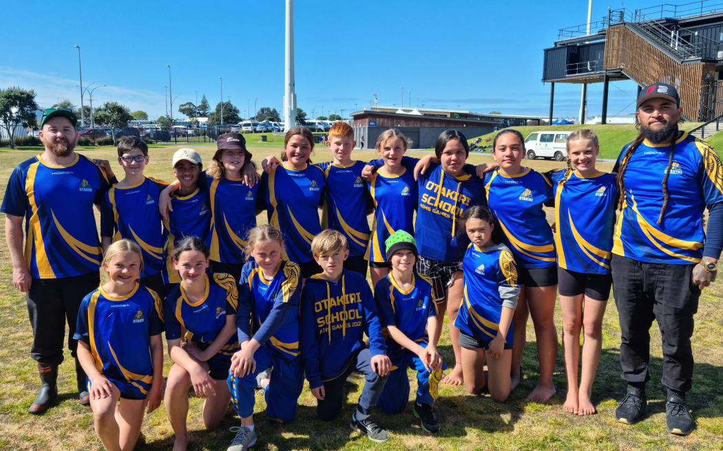 Matt Brown (left) with his Rip Rugby team from Otakiri School in the Eastern Bay of Plenty.