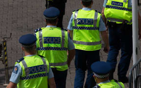 Police rotate their frontline against convoy protesters at parliament.